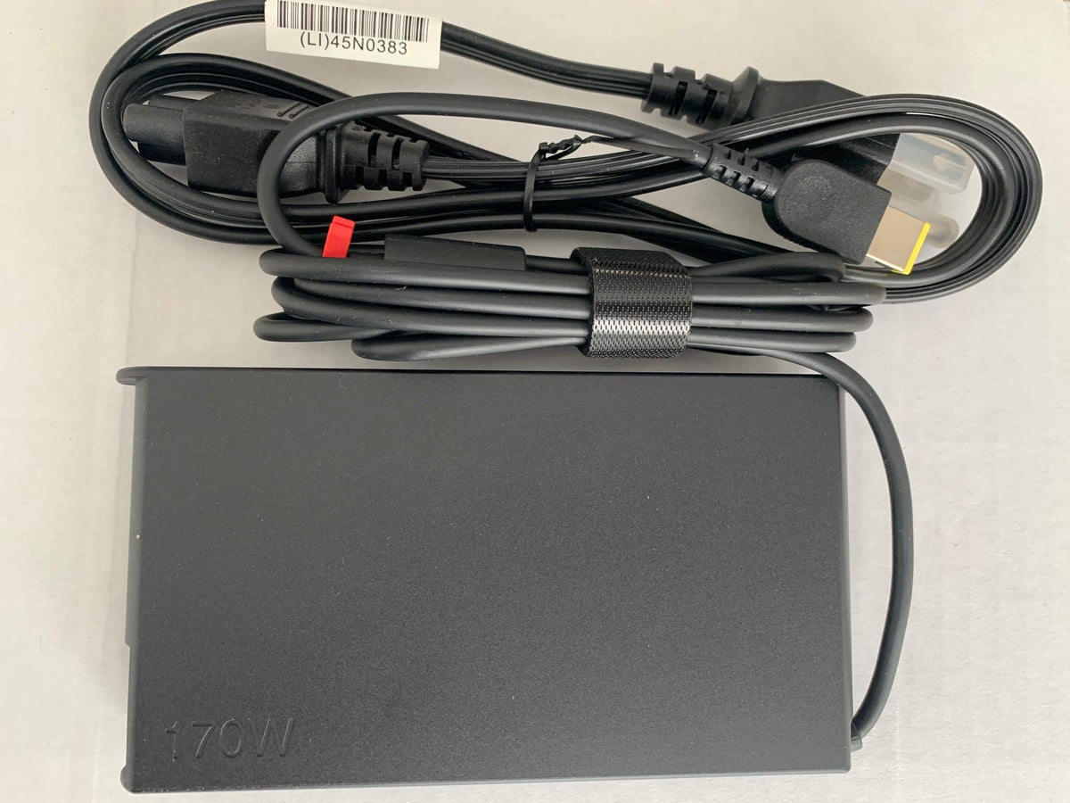 Lenovo adapter plugged into ThinkPad port — stable power delivery while working