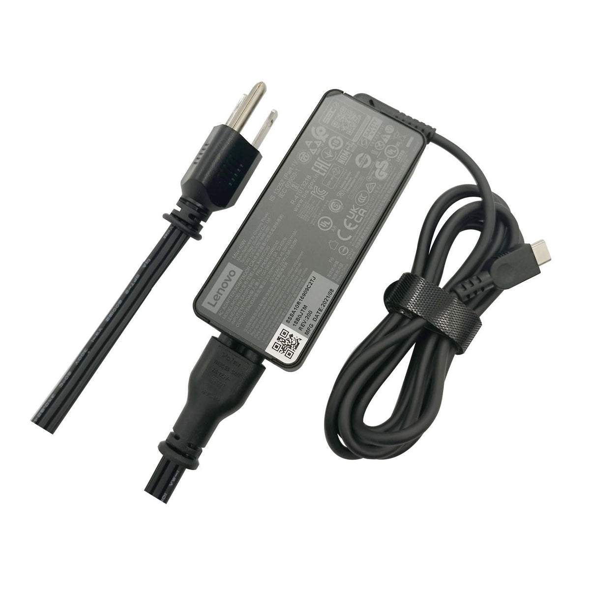 Lenovo ADLX45YCC3G charger on desk powering a laptop efficiently