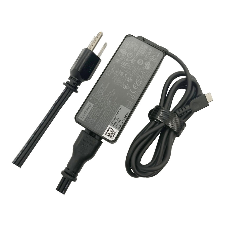 Lenovo ADLX45YCC3G charger on desk powering a laptop efficiently