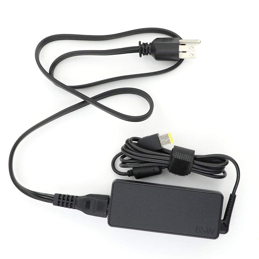 Lenovo 65W power adapter in a clean workspace.