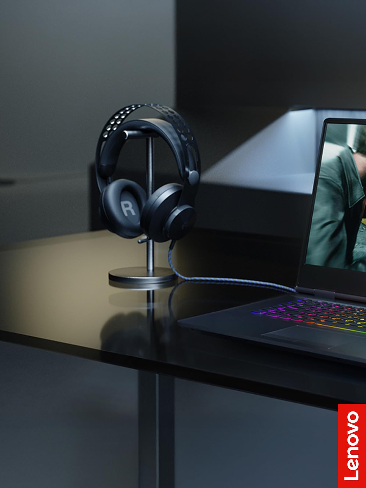 Lenovo Legion H500 Pro 7.1 user in action wearing the headset during gaming session.