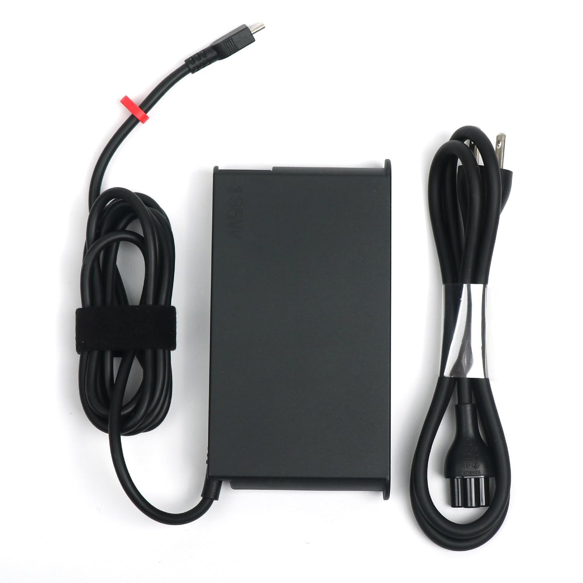 Lenovo original 135W USB-C adapter side view highlights compact design for easy storage.