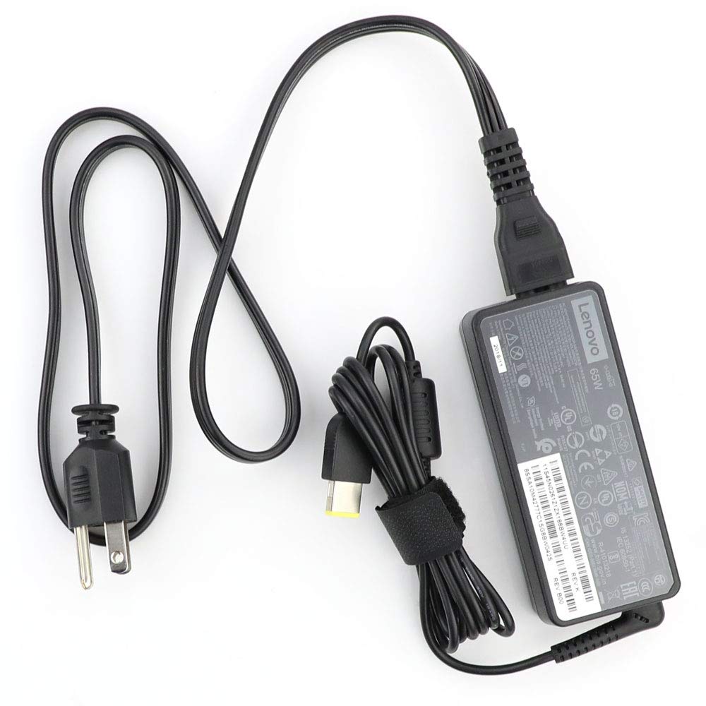 Lenovo charger with slim tip cable neatly coiled.