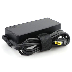 Lenovo 65W charger connected to a ThinkCentre device.