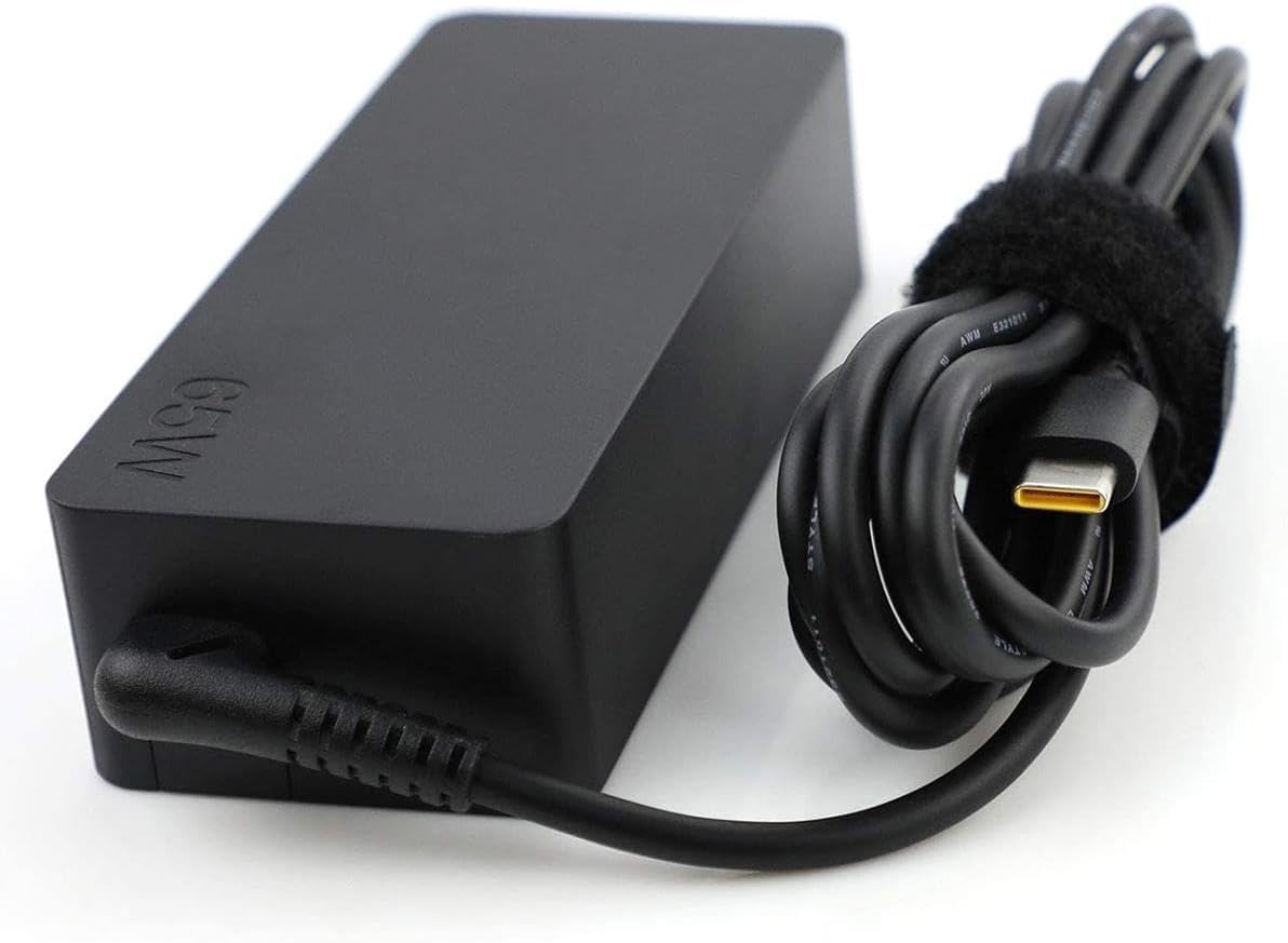 Lenovo adapter plugged into wall powering laptop for fast, steady charging