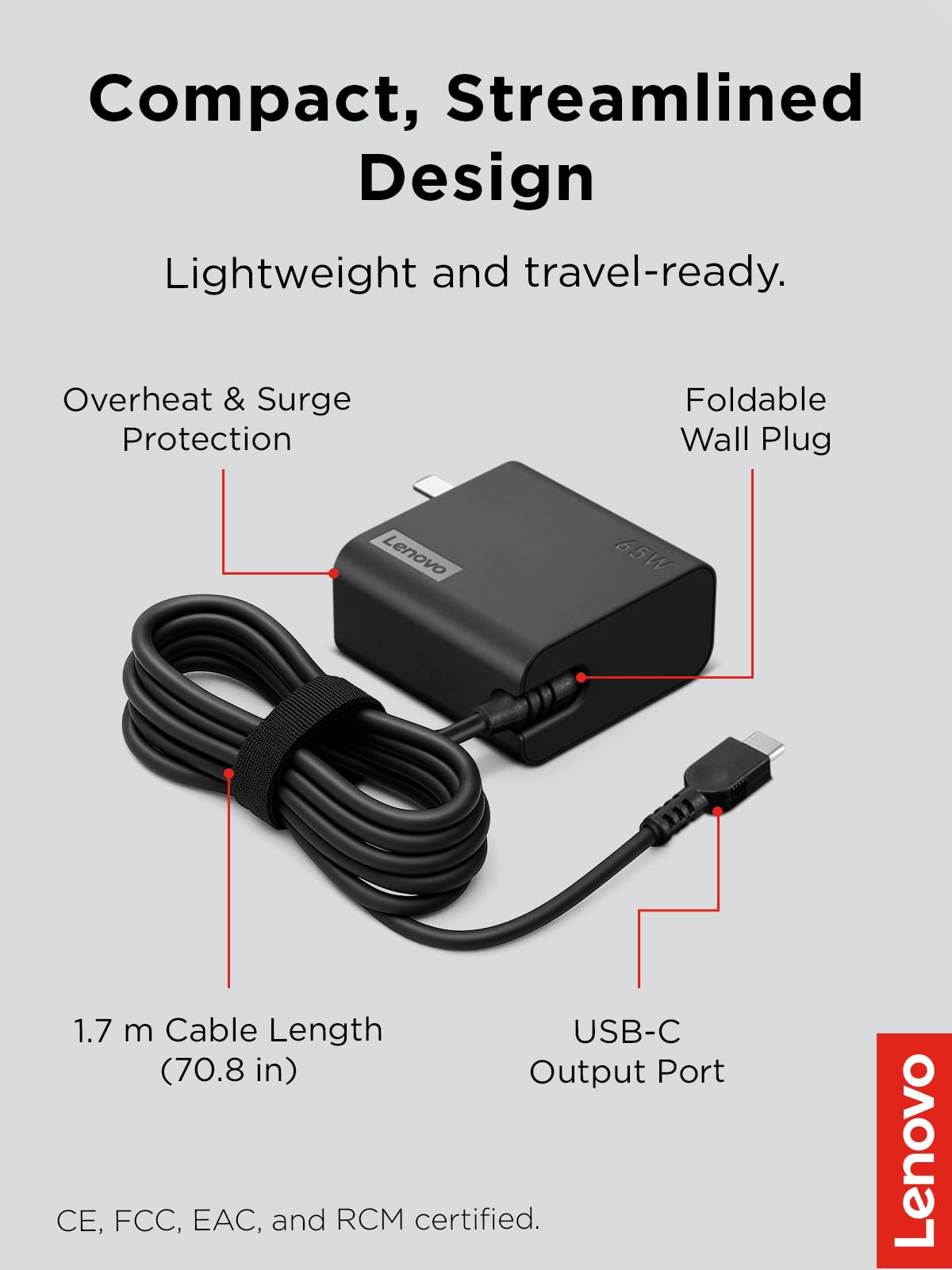Lenovo USB-C 65W adapter plugged into laptop illustrating fast charging capability
