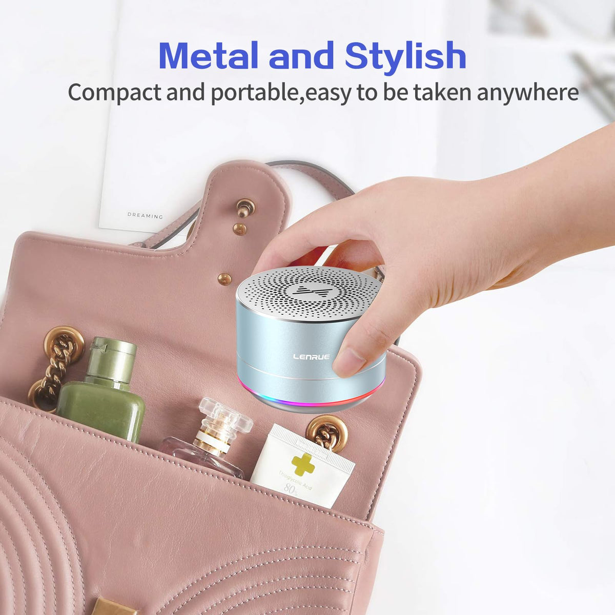 LENRUE sky-blue metal-bodied speaker angled view highlights durable build for travel