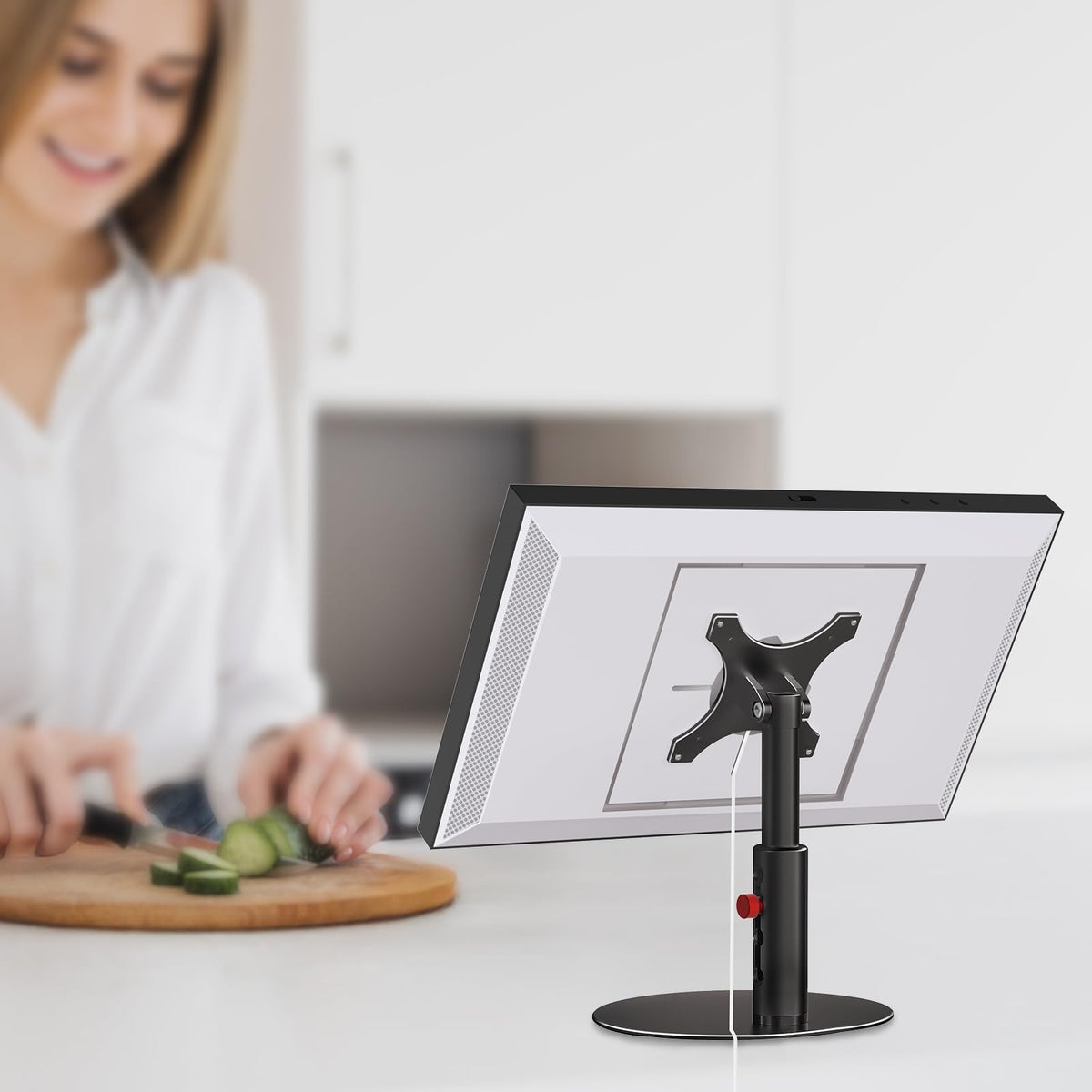Letlar stand next to ruler showing scale and compact footprint advantage