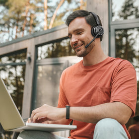 LEVN headset in home office lifestyle showing organized workspace efficiency
