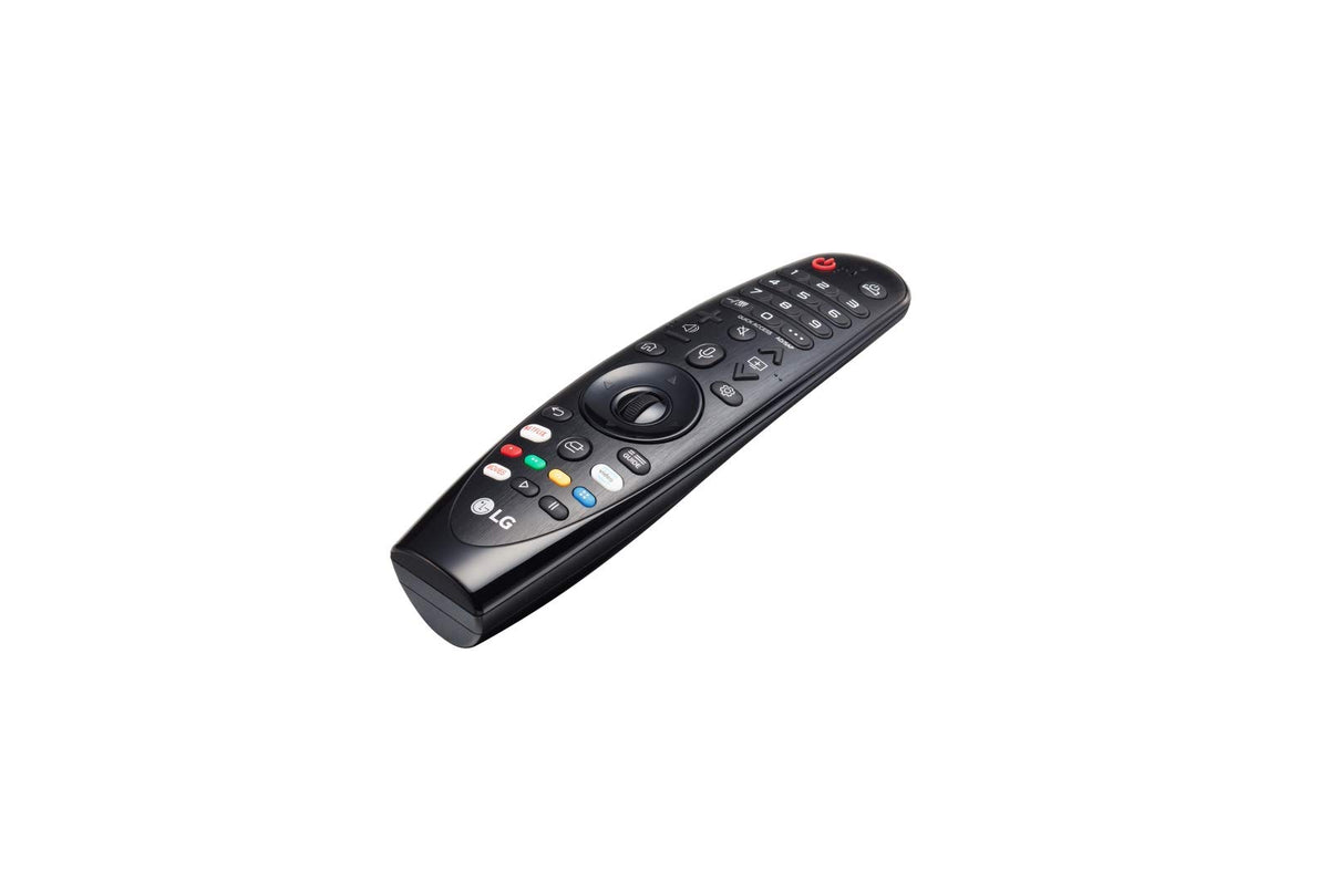 LG Magic Remote held in hand for scale showing ergonomic design and comfortable use