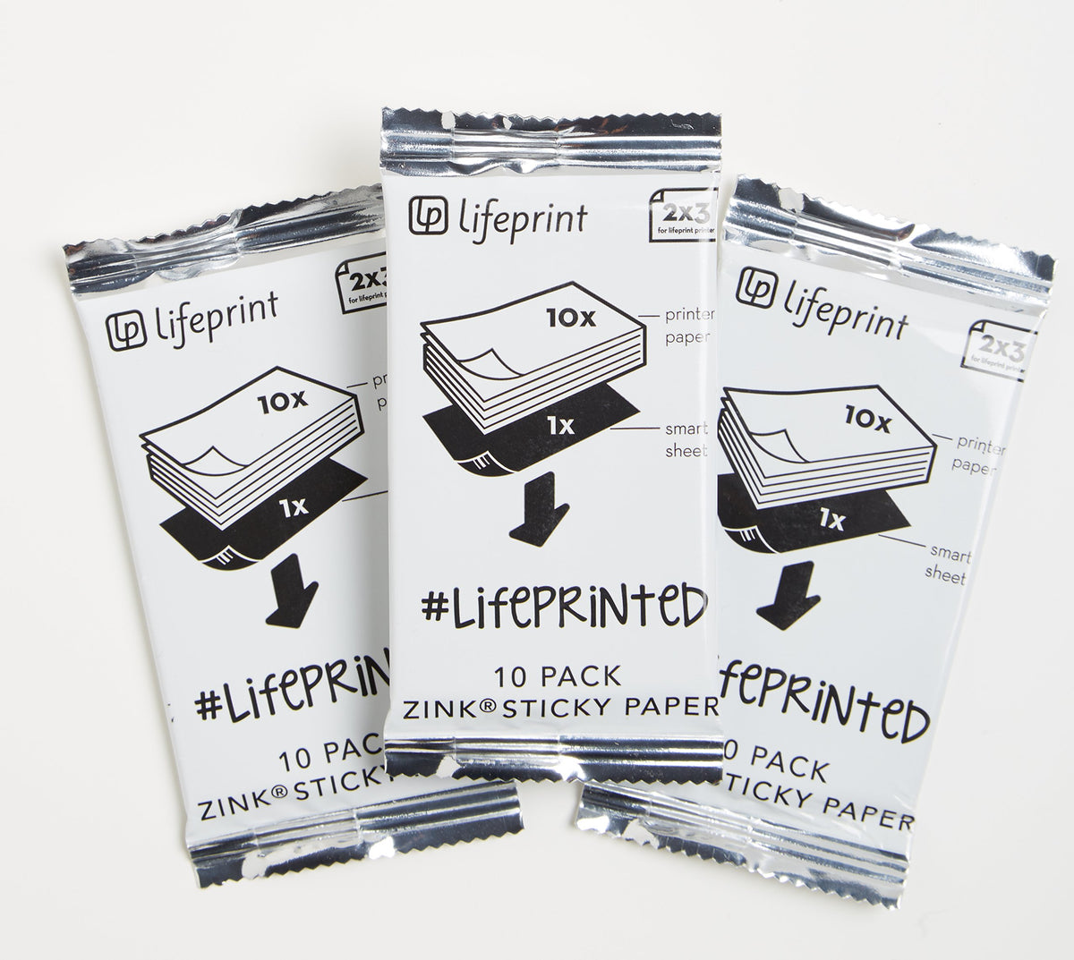 Lifeprint printed 2x3 sticky photo on a laptop illustrating quick decor and sharing