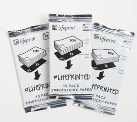 Lifeprint printed 2x3 sticky photo on a laptop illustrating quick decor and sharing