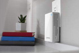Linksys Velop with Linksys app on phone demonstrating easy setup and management benefit