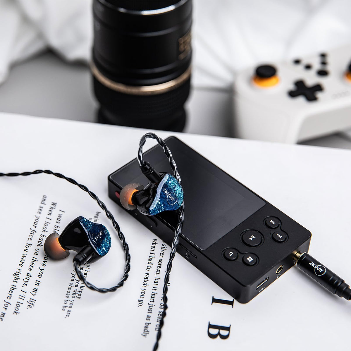 Linsoul Arete earphones shown in portable on-the-go listening setup.