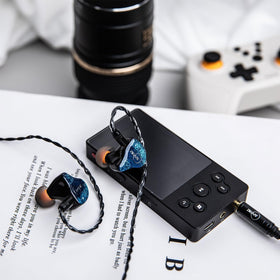 Linsoul Arete earphones shown in portable on-the-go listening setup.