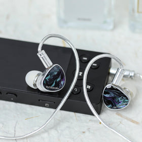 Linsoul DAWN Ms OFC detachable cable coiled to show shielded silver-plated conductors reducing noise benefit