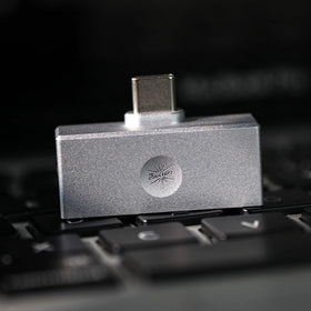 Linsoul Allegro Mini in a travel audio setup illustrating portable studio sound