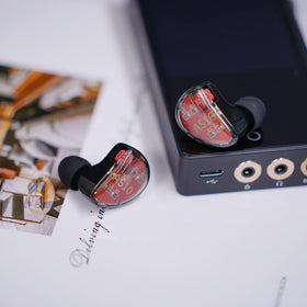 Linsoul KZ AS10 packaging and accessories arranged to show included cable and tips