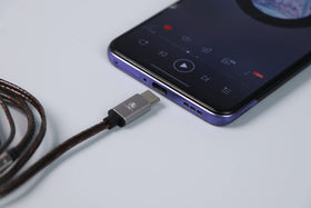 Linsoul Salnotes Zero driver close-up illustrating metal-composite diaphragm for clearer sound