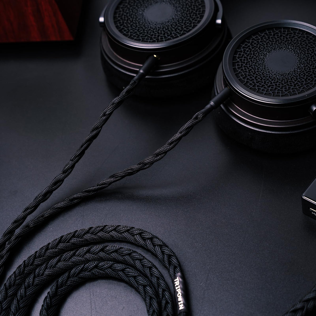 Linsoul Tripowin cable next to ruler showing 1.5m length for desktop use