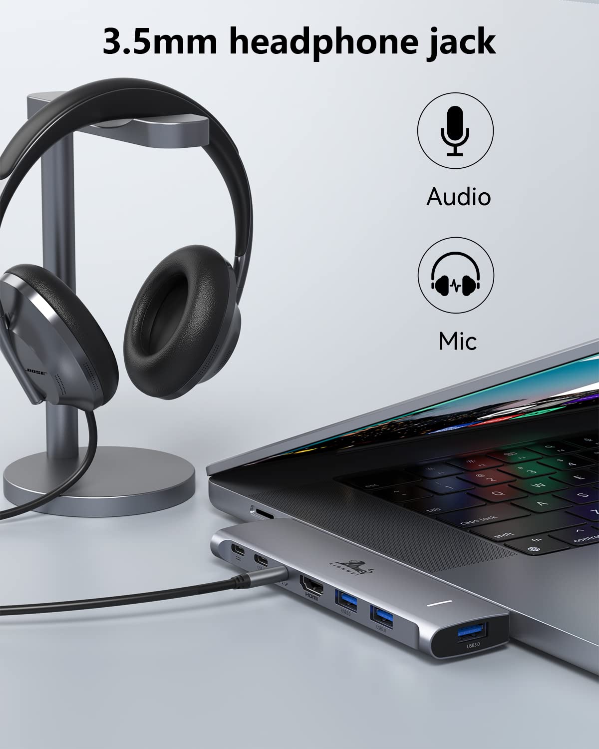 LIONWEI beside MacBook showing compact scale and travel-ready portability