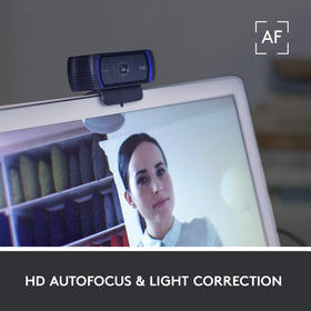 Logitech C920 glass lens closeup highlighting optical clarity benefit sharper images