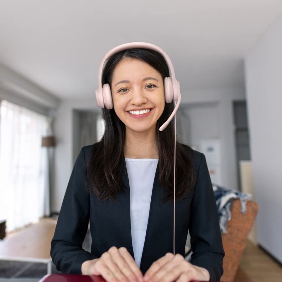 Logitech H390 rose headset side view with adjustable headband.