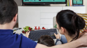 Logitech K400 Plus renewed packaging emphasizing inspected condition and included accessories