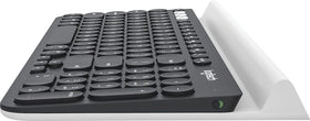 Logitech K780 in use with tablet demonstrating multi-device switching convenience
