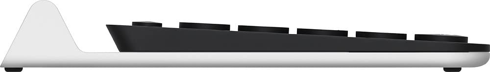 Logitech K780 scale with phone and laptop showing compact footprint and versatility