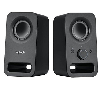 Logitech Z150 front view on desk showing compact black speakers and clear stereo placement benefit