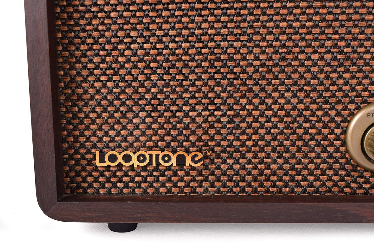 LoopTone next to book for scale, compact size fits small surfaces