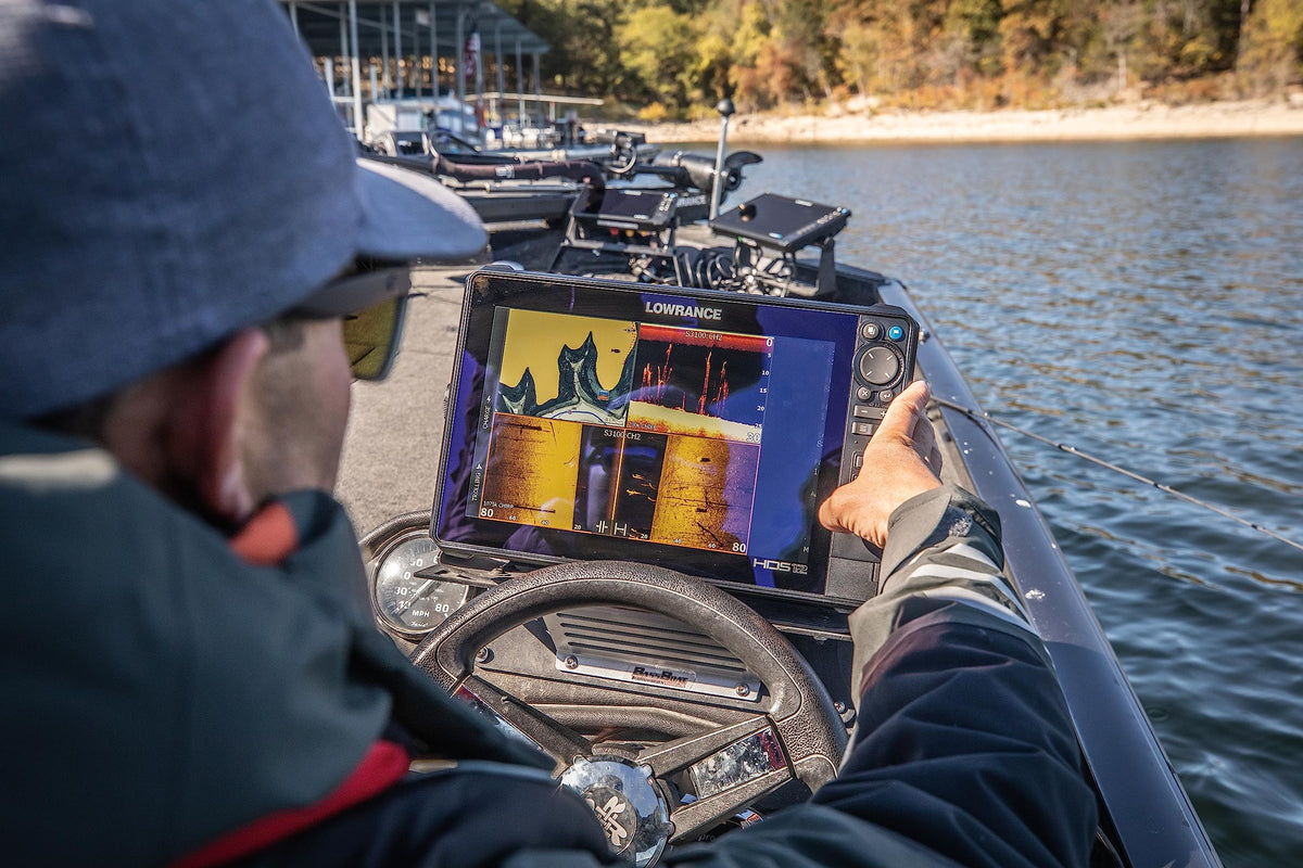 Lowrance HDS PRO 12 onboard C-MAP Discover charts provide lake contours for navigation.