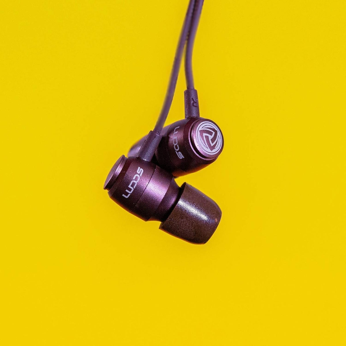 LUDOS Clamor earbuds in commute setting for durable daily use
