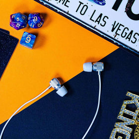 LUDOS earbuds in use with smartphone demonstrating low-latency audio