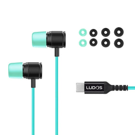 LUDOS earbuds held in hand to show compact scale and portability