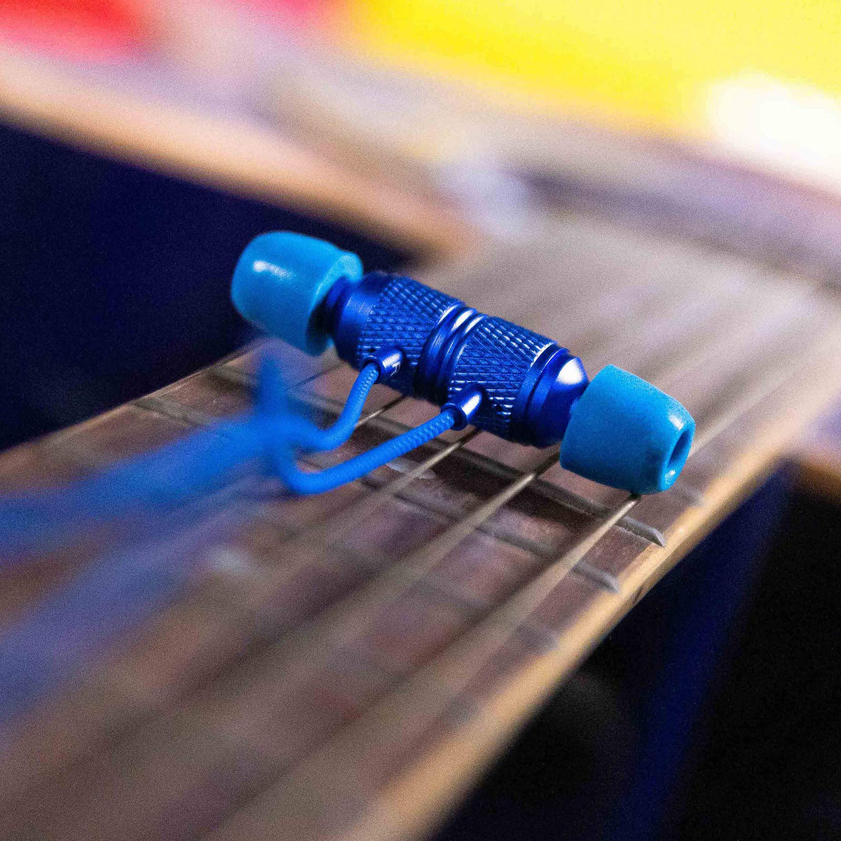 LUDOS Ultra wired earbuds blue durable cord for reliable connections during workouts.