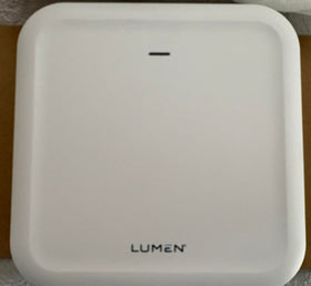 Lumen Quantum W1700K POD placed in living room for easy setup.