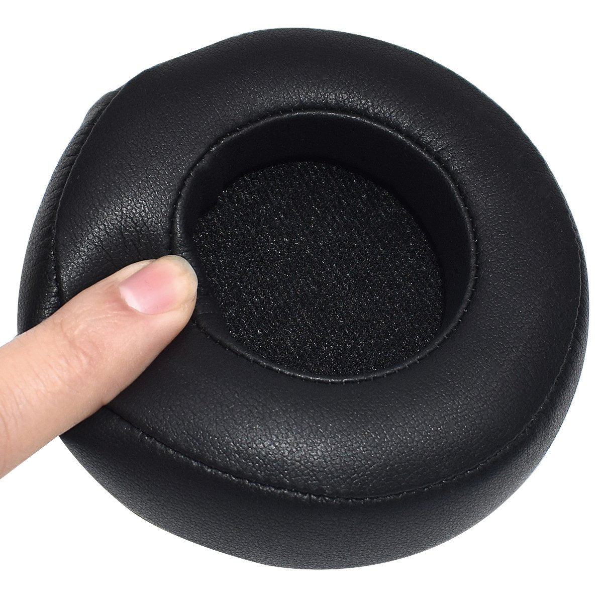 Lusgawer earpad next to ruler showing 95mm outer diameter, confirms correct sizing benefit