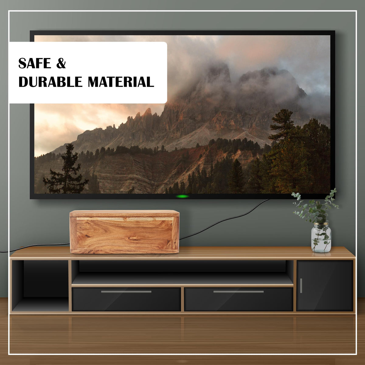 Luxe Designs beside TV console concealing entertainment cables neatly