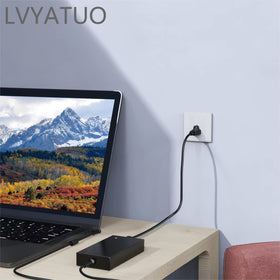 LVYATUO adapter next to a ruler showing portable size for travel convenience