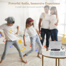 M-Amazup on a table next to books for a compact home audio lifestyle fit