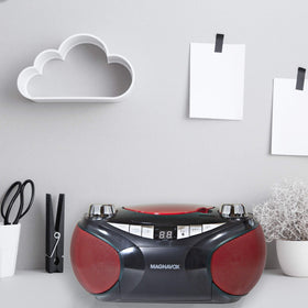 Magnavox MD6949 top-loading CD tray open demonstrating disc compatibility and simple loading