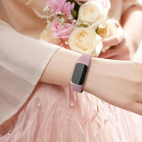Maledan compatible with Fitbit Charge on wrist with slim, low-profile silhouette.