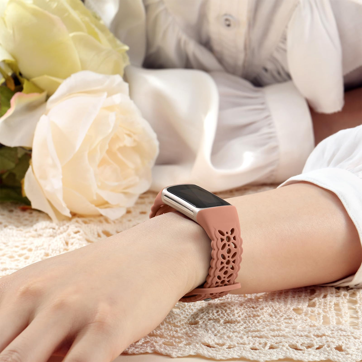 Maledan floral sport band worn on the wrist for daily wear.