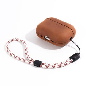 Maogoam AirPods Pro 3 case shows patina development highlighting rugged leather character.