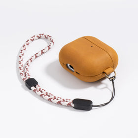 Maogoam AirPods 4 braided hand strap for hands-free carry.