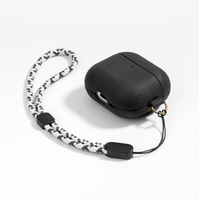 Maogoam AirPods 4 leather case with braided hand strap for secure daily carry.
