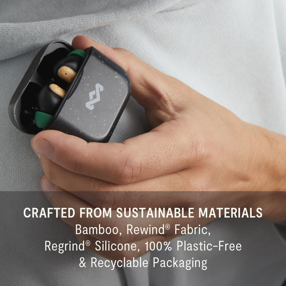 House of Marley Little Bird earbuds in commute setting showing practical everyday use