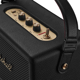 Marshall Kilburn III portable scene shows compact form for beach or park listening.